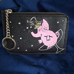 kate spade black coin pouch with pink elephant and gold accents
